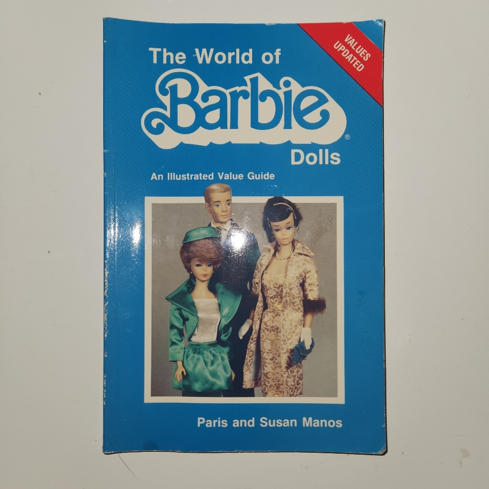 The World of Barbie Dolls: An Illustrated Value GuideBook with receipt from 1998